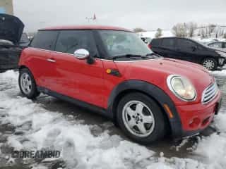 2009 MINI Hardtop with VIN WMWMF33559TU70753, listed as a Copart auction lot 79898174 with 63,051 mi miles and Salvage title. Bid and sale history available at DreamBid. Image 4.