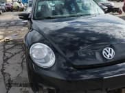 ✅ 2014 Volkswagen Beetle 1.8T • VIN: 3VWJ07AT8EM660665 • Lot: 80188155. Listed on Copart with 163,144 mi. Free auction sales archive from the USA and detailed vehicle history report at DreamBid. Image 14.