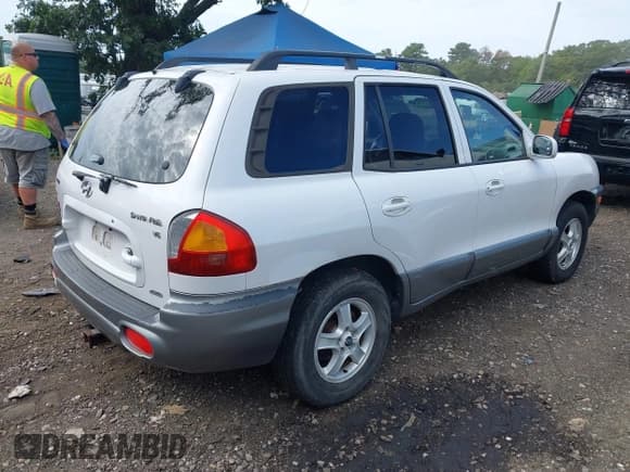 ✅ 2004 Hyundai Santa Fe GLS • VIN: KM8SC73D24U599503 • Lot: 43200700. Listed on IAAI with 179,315 mi. Free auction sales archive from the USA and detailed vehicle history report at DreamBid. Image 4.