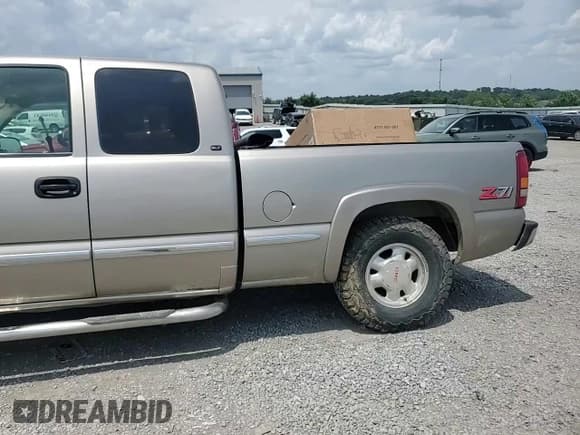 ✅ 1999 GMC Sierra 1500 SLE • VIN: 2GTEK19T5X1512872 • Лот: 65164465. Опубликован ранее на Copart с пробегом 163 220 миль. Бесплатный доступ к архиву аукционных продаж из США и подробный отчёт об истории автомобиля на DreamBid. Изображение 13.