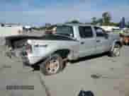 2004 Dodge Dakota Sport с VIN 1D7HG38N34S770063, выставлен на аукционе Copart как лот 71457315 с пробегом 320 703 миль миль и Списание • Salvage title. История ставок и продаж доступна на DreamBid. Изображение 3.