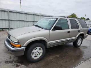 ✅ 2001 Chevrolet Blazer LT • VIN: 1GNDT13W812212561 • Lot: 85734445. Wystawiony na Copart z przebiegiem 202 742 mil. Bezpłatny archiwum sprzedaży aukcyjnych z USA i szczegółowy raport historii pojazdu na DreamBid. Zdjęcie 1.