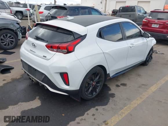 2019 Hyundai Veloster Turbo z VIN KMHTH6AB3KU020193, wystawiony jako IAAI lot #41526722 z przebiegiem 54 697 mil mil oraz . Historia ofert i sprzedaży dostępna na DreamBid. Obrazek 4.