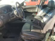 ✅ 2014 Chevrolet Impala LTZ • VIN: 2G1WC5E34E1153518 • Lot: 72615554. Wystawiony na Copart z przebiegiem 192 051 mil. Bezpłatny archiwum sprzedaży aukcyjnych z USA i szczegółowy raport historii pojazdu na DreamBid. Zdjęcie 7.