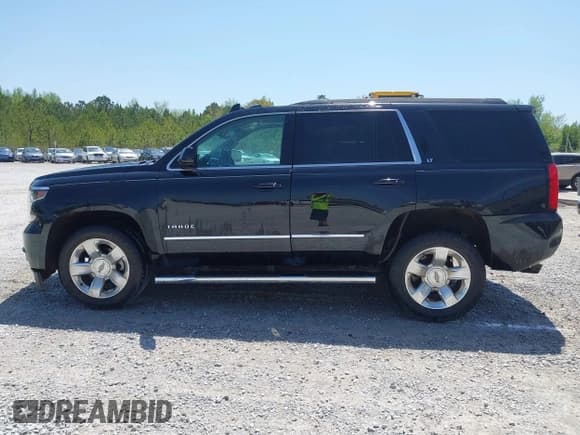 ✅ 2019 Chevrolet Tahoe LT • VIN: 1GNSCBKC4KR231153 • Lot: 42017325. Listed on IAAI with 116,960 mi. Free auction sales archive from the USA and detailed vehicle history report at DreamBid. Image 14.