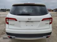 ✅ 2022 Honda Pilot Touring 7-Passenger • VIN: 5FNYF5H65NB030899 • Lot: 67962524. Listed on Copart with 34,124 mi. Free auction sales archive from the USA and detailed vehicle history report at DreamBid. Image 6.