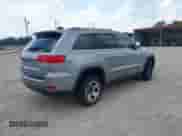 2018 Jeep Grand Cherokee Limited z VIN 1C4RJEBG4JC131623, wystawiony jako IAAI lot #42806022 z przebiegiem 137 938 mil mil oraz . Historia ofert i sprzedaży dostępna na DreamBid. Obrazek 4.