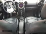 ✅ 2014 MINI Countryman S • VIN: WMWZC5C53EWP37312 • Lot: 57952885. Listed on Copart with 115,708 mi. Free auction sales archive from the USA and detailed vehicle history report at DreamBid. Image 8.