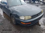 ✅ 1993 Toyota Camry DLX • VIN: 4T1SK11EXPU182114 • Лот: 41954624. Опубликован ранее на IAAI с пробегом 244 422 миль. Бесплатный доступ к архиву аукционных продаж из США и подробный отчёт об истории автомобиля на DreamBid. Изображение 6.