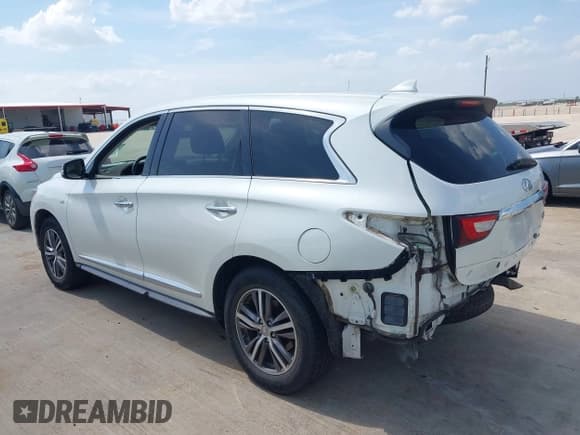 ✅ 2016 Infiniti QX60 • VIN: 5N1AL0MN9GC512376 • Lot: 42872415. Listed on IAAI with 167,814 mi. Free auction sales archive from the USA and detailed vehicle history report at DreamBid. Image 14.