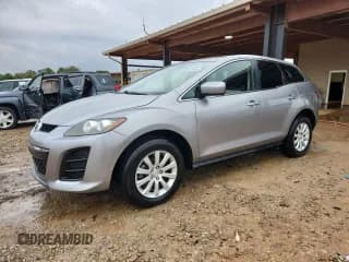 ✅ 2011 Mazda CX-7 i Sport • VIN: JM3ER2B56B0365521 • Лот: 90121665. Опубликован ранее на Copart с пробегом 144 839 миль. Бесплатный доступ к архиву аукционных продаж из США и подробный отчёт об истории автомобиля на DreamBid. Изображение 1.