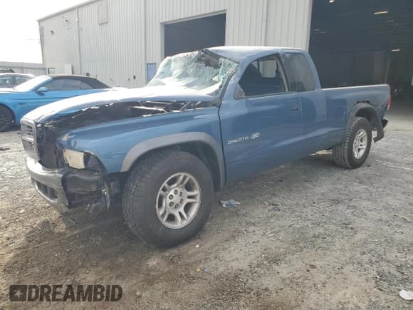 ✅ 2002 Dodge Dakota • VIN: 1B7GL12X12S669374 • Lot: 81964605. Wystawiony na Copart z przebiegiem 71 608 mil. Bezpłatny archiwum sprzedaży aukcyjnych z USA i szczegółowy raport historii pojazdu na DreamBid. Zdjęcie 1.