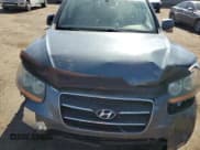 ✅ 2009 Hyundai Santa Fe Limited • VIN: 5NMSH73E39H264585 • Lot: 71201984. Listed on Copart with 124,152 mi. Free auction sales archive from the USA and detailed vehicle history report at DreamBid. Image 14.