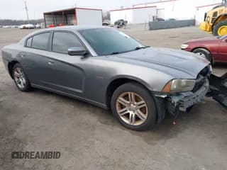 ✅ 2011 Dodge Charger • VIN: 2B3CL1CG5BH583796 • Lot: 43835984. Listed on IAAI with 152,813 mi. Free auction sales archive from the USA and detailed vehicle history report at DreamBid. Image 1.