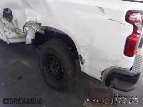 2021 Chevrolet Silverado 1500 Work Truck z VIN 3GCNWAEF8MG164749, wystawiony jako IAAI lot #43632324 z przebiegiem 90 987 mil mil oraz . Historia ofert i sprzedaży dostępna na DreamBid. Obrazek 13.