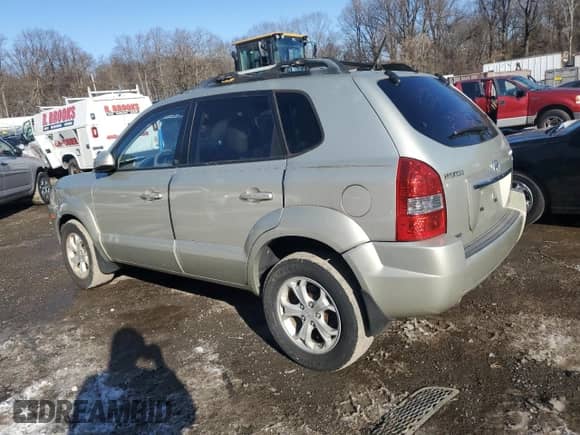 2009 Hyundai Tucson SE with VIN KM8JN72D19U970813, listed as a Copart auction lot 88469545 with 152,648 mi miles and Salvage title. Bid and sale history available at DreamBid. Image 2.