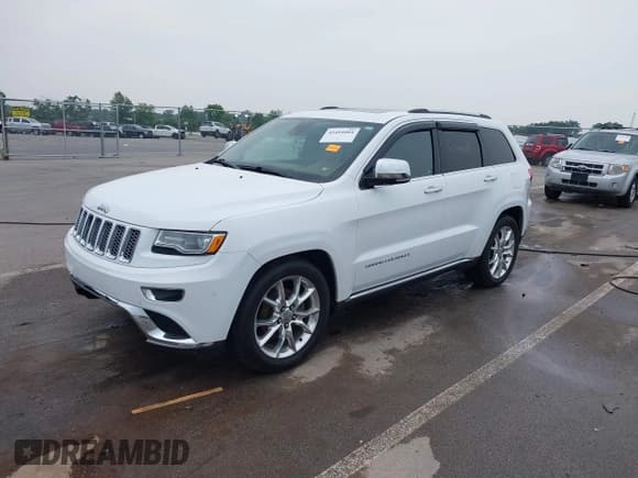 ✅ 2015 Jeep Grand Cherokee Summit • VIN: 1C4RJFJG1FC135935 • Lot: 42494004. Listed on IAAI with 201,553 mi. Free auction sales archive from the USA and detailed vehicle history report at DreamBid. Image 2.