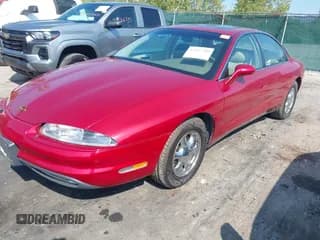 ✅ 1998 Oldsmobile Aurora • VIN: 1G3GR62C0W4119585 • Lot: 43257789. Wystawiony na IAAI z przebiegiem 88 408 mil. Bezpłatny archiwum sprzedaży aukcyjnych z USA i szczegółowy raport historii pojazdu na DreamBid. Zdjęcie 6.