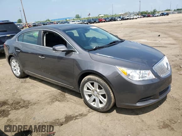 ✅ 2013 Buick LaCrosse Leather • VIN: 1G4GC5E33DF137647 • Lot: 59911315. Listed on Copart with 117,812 mi. Free auction sales archive from the USA and detailed vehicle history report at DreamBid. Image 4.