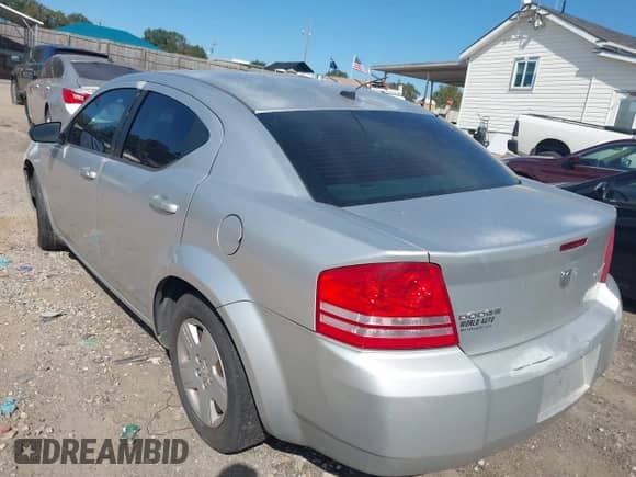 2010 Dodge Avenger SXT with VIN 1B3CC4FB2AN101552, listed as a IAAI auction lot 43498881 with 214,721 mi miles and . Bid and sale history available at DreamBid. Image 3.