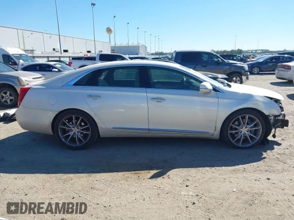 ✅ 2015 Cadillac XTS Premium • VIN: 2G61R5S38F9155816 • Lot: 41830536. Listed on IAAI with 105,891 mi. Free auction sales archive from the USA and detailed vehicle history report at DreamBid. Image 14.