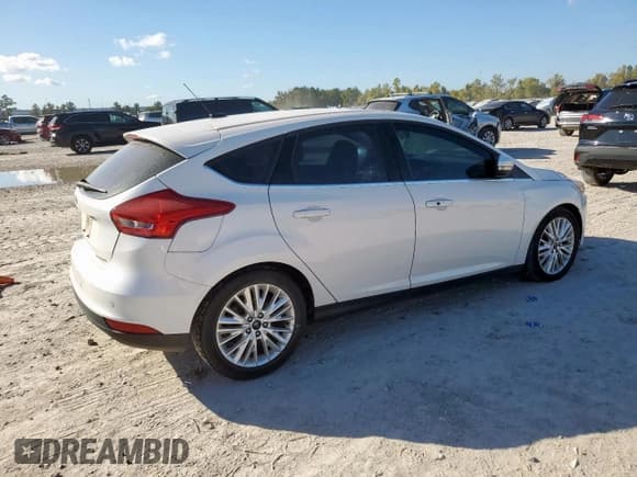 ✅ 2018 Ford Focus Titanium • VIN: 1FADP3N27JL289666 • Lot: 93083115. Listed on Copart with 125,357 mi. Free auction sales archive from the USA and detailed vehicle history report at DreamBid. Image 3.