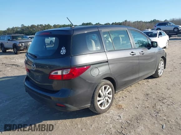 ✅ 2015 Mazda 5 Sport • VIN: JM1CW2BL6F0186439 • Lot: 41376755. Listed on IAAI with 186,680 mi. Free auction sales archive from the USA and detailed vehicle history report at DreamBid. Image 4.