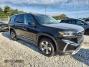 ✅ 2023 Honda Pilot EX-L • VIN: 5FNYG2H4XPB000486 • Lot: 70055295. Wystawiony na Copart z przebiegiem 23 803 mil. Bezpłatny archiwum sprzedaży aukcyjnych z USA i szczegółowy raport historii pojazdu na DreamBid. Zdjęcie 4.