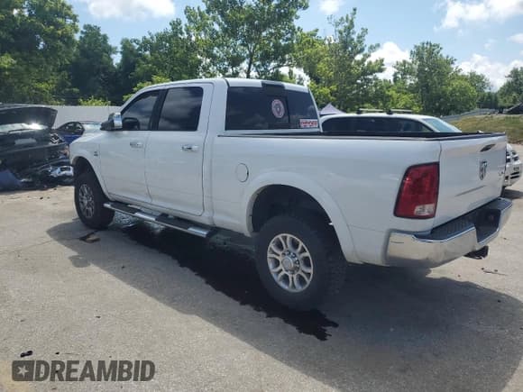 ✅ 2012 Ram 2500 Laramie • VIN: 3C6UD5FL8CG174359 • Lot: 63321605. Listed on Copart with 300,972 mi. Free auction sales archive from the USA and detailed vehicle history report at DreamBid. Image 2.