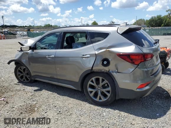 ✅ 2017 Hyundai Santa Fe Ultimate • VIN: 5XYZW4LA8HG491652 • Lot: 56907985. Listed on Copart with Not provided. Free auction sales archive from the USA and detailed vehicle history report at DreamBid. Image 2.