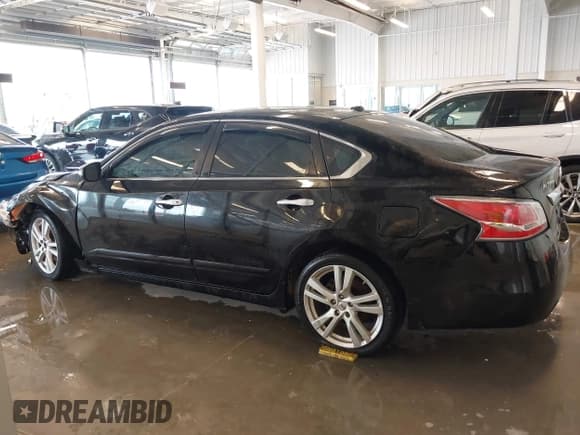 ✅ 2015 Nissan Altima SL • VIN: 1N4BL3AP7FC161424 • Lot: 42119480. Listed on IAAI with 143,648 mi. Free auction sales archive from the USA and detailed vehicle history report at DreamBid. Image 14.