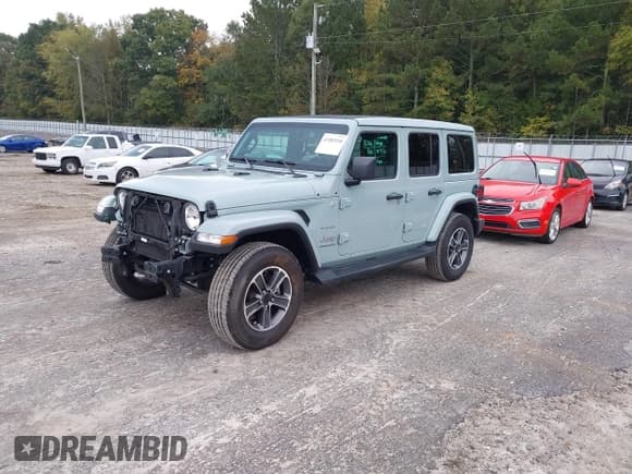 ✅ 2023 Jeep Wrangler Sahara • VIN: 1C4HJXEG5PW511502 • Lot: 43383510. Listed on IAAI with 24,169 mi. Free auction sales archive from the USA and detailed vehicle history report at DreamBid. Image 2.