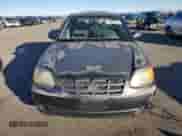 2005 Hyundai Accent GLS with VIN KMHCG45C95U665574, listed as a Copart auction lot 82603804 with 154,187 mi miles and Salvage title. Bid and sale history available at DreamBid. Image 5.