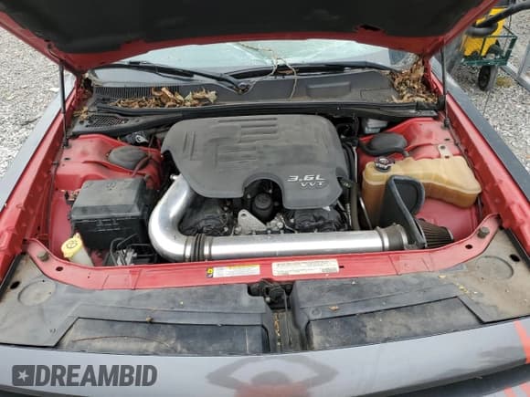 ✅ 2012 Dodge Challenger SXT • VIN: 2C3CDYAG1CH259290 • Lot: 74770014. Wystawiony na Copart z przebiegiem 134 441 mil. Bezpłatny archiwum sprzedaży aukcyjnych z USA i szczegółowy raport historii pojazdu na DreamBid. Zdjęcie 11.