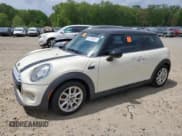 ✅ 2014 MINI Hardtop • VIN: WMWXM5C55ET935735 • Lot: 53735455. Listed on Copart with 53,280 mi. Free auction sales archive from the USA and detailed vehicle history report at DreamBid. Image 1.
