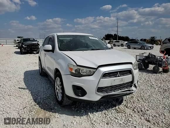 2014 Mitsubishi Outlander ES z VIN 4A4AP3AU9EE009186, wystawiony jako Copart lot #82195395 z przebiegiem 123 640 mil mil oraz Szkoda całkowita • Salvage title. Historia ofert i sprzedaży dostępna na DreamBid. Obrazek 14.