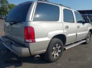 ✅ 2004 Cadillac Escalade • VIN: 1GYEK63N14R200973 • Lot: 42926800. Listed on IAAI with 261,068 mi. Free auction sales archive from the USA and detailed vehicle history report at DreamBid. Image 4.