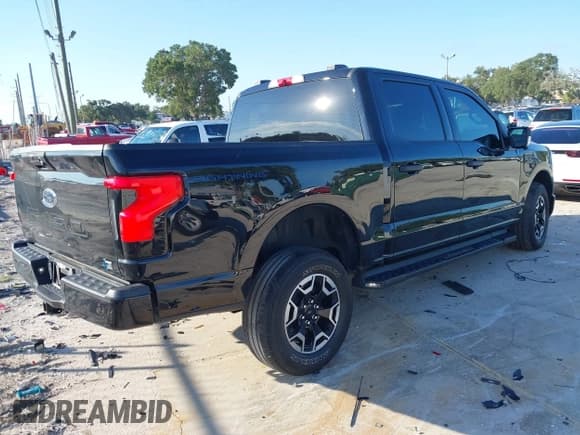 ✅ 2023 Ford F-150 Lightning Pro • VIN: 1FTVW1EL8PWG28909 • Лот: 43019707. Опубликован ранее на IAAI с пробегом 54 759 миль. Бесплатный доступ к архиву аукционных продаж из США и подробный отчёт об истории автомобиля на DreamBid. Изображение 4.