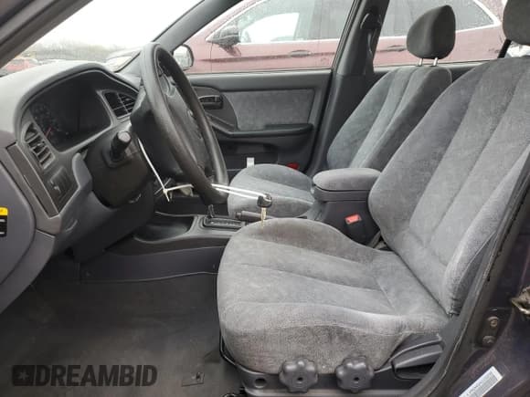 ✅ 2002 Hyundai Elantra GLS • VIN: KMHDN45D42U292698 • Lot: 52349925. Wystawiony na Copart z przebiegiem 99 424 mil. Bezpłatny archiwum sprzedaży aukcyjnych z USA i szczegółowy raport historii pojazdu na DreamBid. Zdjęcie 7.