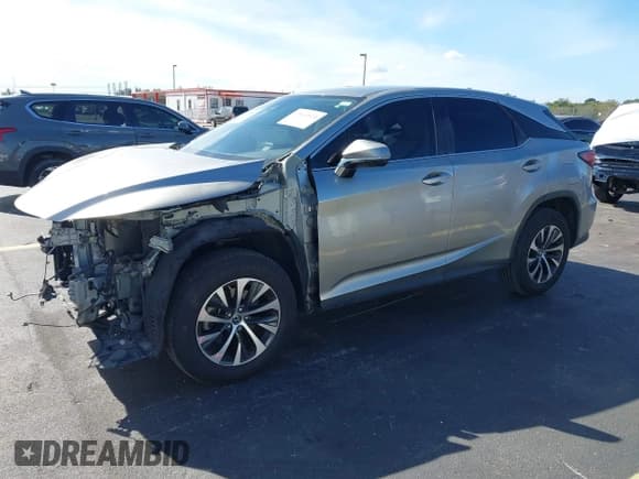 ✅ 2020 Lexus RX 350 • VIN: 2T2AZMAA2LC165451 • Lot: 43664524. Listed on IAAI with 103,122 mi. Free auction sales archive from the USA and detailed vehicle history report at DreamBid. Image 18.
