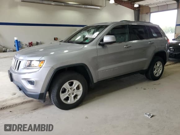 ✅ 2015 Jeep Grand Cherokee Laredo • VIN: 1C4RJFAG0FC834764 • Lot: 82690815. Listed on Copart with 67,519 mi. Free auction sales archive from the USA and detailed vehicle history report at DreamBid. Image 1.