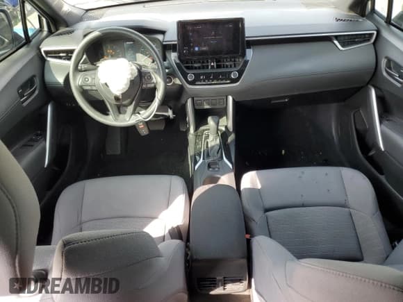 ✅ 2023 Toyota Corolla Cross Hybrid S • VIN: 7MUFBABG5PV017023 • Lot: 90942025. Listed on Copart with 18,740 mi. Free auction sales archive from the USA and detailed vehicle history report at DreamBid. Image 8.