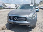 ✅ 2014 Infiniti QX70 • VIN: JN8CS1MW5EM411653 • Lot: 42690935. Listed on IAAI with 110,806 mi. Free auction sales archive from the USA and detailed vehicle history report at DreamBid. Image 12.