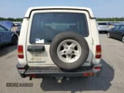✅ 1998 Land Rover Discovery SD • VIN: SALJY1246WA781850 • Lot: 69113644. Wystawiony na Copart z przebiegiem 58 468 mil. Bezpłatny archiwum sprzedaży aukcyjnych z USA i szczegółowy raport historii pojazdu na DreamBid. Zdjęcie 6.