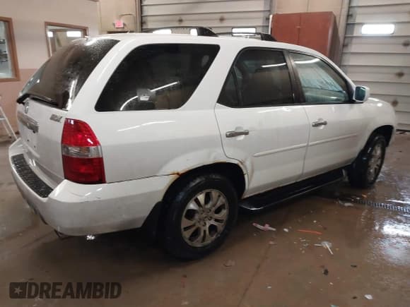✅ 2003 Acura MDX Touring • VIN: 2HNYD187X3H502233 • Lot: 41863001. Wystawiony na IAAI z przebiegiem 237 656 mil. Bezpłatny archiwum sprzedaży aukcyjnych z USA i szczegółowy raport historii pojazdu na DreamBid. Zdjęcie 4.