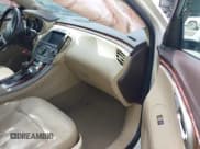 ✅ 2013 Buick LaCrosse Premium 2 • VIN: 1G4GH5E39DF129375 • Lot: 41741851. Wystawiony na IAAI z przebiegiem 124 404 mil. Bezpłatny archiwum sprzedaży aukcyjnych z USA i szczegółowy raport historii pojazdu na DreamBid. Zdjęcie 5.