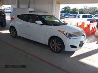 ✅ 2016 Hyundai Veloster • VIN: KMHTC6AD8GU269483 • Lot: 43445704. Listed on IAAI with 121,575 mi. Free auction sales archive from the USA and detailed vehicle history report at DreamBid. Image 1.