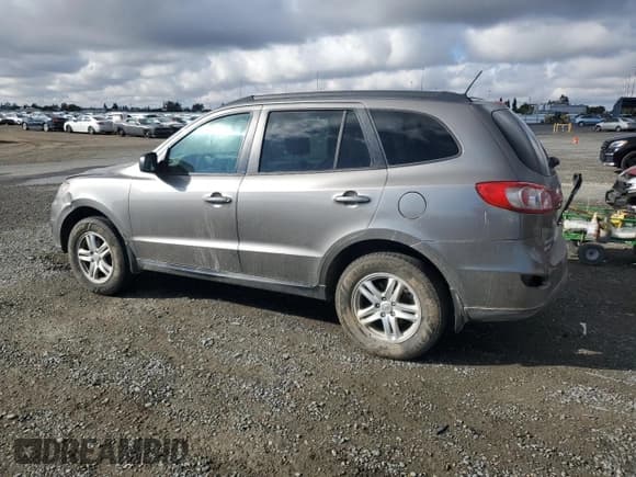 ✅ 2012 Hyundai Santa Fe GLS • VIN: 5XYZGDAB7CG164774 • Lot: 78517034. Listed on Copart with 267,198 mi. Free auction sales archive from the USA and detailed vehicle history report at DreamBid. Image 2.