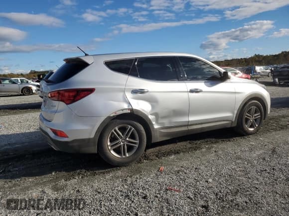 ✅ 2018 Hyundai Santa Fe 2.4L • VIN: 5XYZT3LB8JG572765 • Lot: 90464505. Listed on Copart with 113,756 mi. Free auction sales archive from the USA and detailed vehicle history report at DreamBid. Image 3.