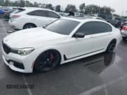 ✅ 2016 BMW 7 Series 740i • VIN: WBA7E2C56GG547033 • Lot: 43693630. Listed on IAAI with 134,884 mi. Free auction sales archive from the USA and detailed vehicle history report at DreamBid. Image 2.